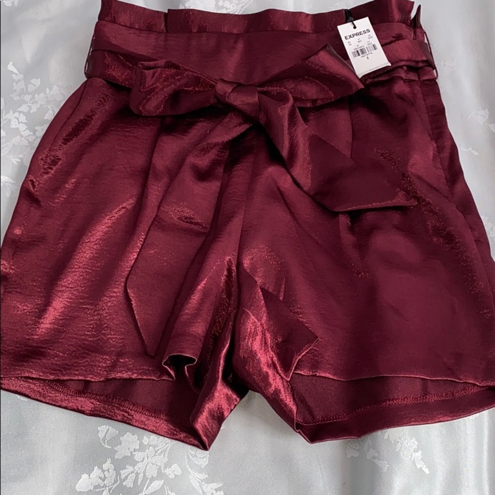 High rise metallic red midi shorts